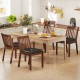 Espresso PU leather upholstered dining chairs with padded seats, set of 4, in a kitchen setting for versatile use.