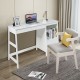 Contemporary white computer desk featuring a spacious 47.5-inch top, two drawers, and a footrest for added comfort.
