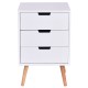 Side view of a white wood nightstand with three drawers and oak legs, designed for stylish storage in any room.
