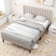 Queen size upholstered platform bed in beige with wingback headboard and wooden slat support for modern bedroom.