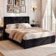 Queen size lift-up storage bed in black corduroy with plush headboard and under-bed storage for organized living.
