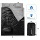 Double waterproof sleeping bag with two pillows, designed for couples, perfect for camping and outdoor activities.