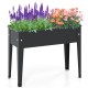 Elevated metal planter box with legs, featuring vibrant flowers, drainage holes, and rust-resistant construction for.