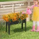 Elevated metal planter box with vibrant flowers, ergonomic height for easy gardening without bending, perfect for.