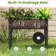 Elevated metal planter box with drainage hole, designed for healthy plant growth and easy access for gardening.