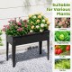 Elevated metal planter box with legs, featuring drainage holes, suitable for flowers, vegetables, and herbs.