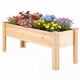 Elevated planter box made of solid fir wood, featuring vibrant flowers, perfect for outdoor gardening and vegetable.