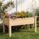 Raised garden bed made of solid fir wood, featuring vibrant flowers and herbs, ideal for outdoor planting.