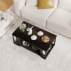 Top view of the rectangle coffee table with brown wood texture, showcasing the spacious tabletop and tiered storage.