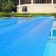 Rectangle swimming pool cover in blue, 12-mil thick PE, designed to retain heat and minimize evaporation for 40FT x.