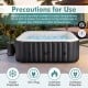 Rectangular black blowup hottub with 130 air jets, designed for 4-6 people, featuring safety precautions for use.