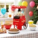 Retro hot air popcorn maker in red with measuring cup, perfect for oil-free popcorn at family gatherings and movie.