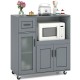 Rolling kitchen island in gray with wheels, featuring a microwave space, glass door cabinet, and spacious tabletop for.