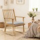 Natural wood rocking chair with padded seat cushion, ergonomic backrest, and rustic charm for relaxing in any room.