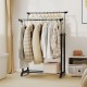 Rolling clothes rack with double rods, adjustable height, and smooth-rolling casters for easy mobility and organization.