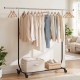 Extendable rolling clothes rack with hanging capacity and storage bins, ideal for laundry and bedroom organization.