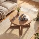 Round 30-inch farmhouse coffee table with sturdy rubber wood legs, featuring a clean surface and elegant rounded edges.