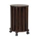 Round walnut nesting stool with a smooth surface and lockable casters, perfect for versatile seating and easy movement.