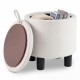 Round beige storage ottoman with removable lid, upholstered in linen fabric, perfect for storing blankets and books.