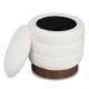 Round storage ottoman in white boucle fabric with acacia wood frame, featuring hidden storage and 360° swivel.