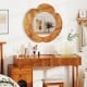 Rustic 29-inch hanging vanity mirror with a solid teak wood frame, elegantly curved for sophisticated decor in any room.