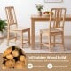 Natural rubber wood dining chairs with ergonomic backrest, showcasing a hollowed design for comfort and stability.