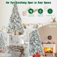 8-foot snow-flocked Christmas tree with white berries and poinsettia flowers, perfect for festive home decoration.