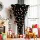 Upside-down 6 feet black artificial Christmas tree with 270 purple LED lights, perfect for unique holiday decor.