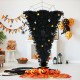 Upside-down black artificial Christmas tree with 270 purple LED lights, decorated with mini pumpkins and skulls for.
