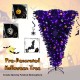 Upside-down 6 feet Halloween tree with 270 purple LED lights and spooky decorations for festive celebrations.