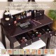 Elegant brown vanity table set with lighted mirror, cushioned stool, and 5 large storage drawers for cosmetics.