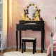Black 5-drawer vanity table set with oval mirror and 12 LED bulbs, perfect for makeup and writing in any room.