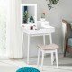 Vanity dressing table set with flip mirror, elegant white design, two drawers, and a comfortable stool for makeup.