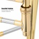 Close-up of the B Flat trombone's gold lacquer finish and brass construction, showcasing its smooth surface and.