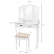 Tri-fold mirror on white vanity set with spacious tabletop, featuring four drawers for organized cosmetic storage.
