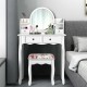 White makeup vanity table set with oval mirror, 4 drawers, and cushioned stool for stylish and functional dressing.