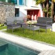 4-piece outdoor rattan conversation set with comfortable cushions, ideal for backyard or poolside relaxation.