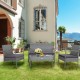4-piece outdoor rattan conversation set featuring a loveseat, two chairs, and a coffee table with cushions for backyard.