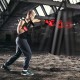 Boxer striking a filled punching bag set with boxing gloves for indoor workout and stress relief, featuring durable PVC.