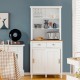Freestanding kitchen pantry with hutch, featuring a wide countertop and open shelf for displaying kitchen essentials.