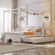 Full size white canopy bed with trundle, solid wood frame, decorated with flags, perfect for kids' bedrooms.