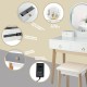 Makeup dressing table with a round mirror, four drawers, and touch-activated light for elegant bedroom decor.