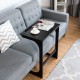 Adjustable C-shape end table in brown with tilting top, perfect for laptops and books beside a sofa for added.