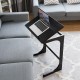 Adjustable C-shape couch end table in brown with tilting top, ideal for laptops and books, designed for comfort and.