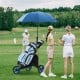 Folding 3 wheels golf push cart in blue with adjustable handle, cup holder, and scoreboard for easy transport on the.
