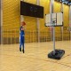Basketball hoop with adjustable height, 50-inch shatterproof backboard, ideal for indoor and outdoor play.