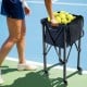 Lightweight foldable tennis ball cart in blue with removable bag, holding 150 balls, ideal for easy transport and.