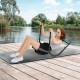 Fitness AB Trainer in black with padded support, used for sit-ups on a dock by the water for a total body workout.