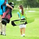 Junior golf club set in green with stand bag, adjustable straps, and rain hood, designed for kids aged 8-10 years.