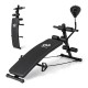 Adjustable decline sit-up bench with speed ball and resistance bands for effective home gym workouts.